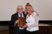 Dr. Suzanne Lunsford receiving from Dr. Nagib Callaos, on behalf of Prof. William Slattery, a plaque "In Appreciation for Delivering a Great Keynote Address at a Plenary Session."